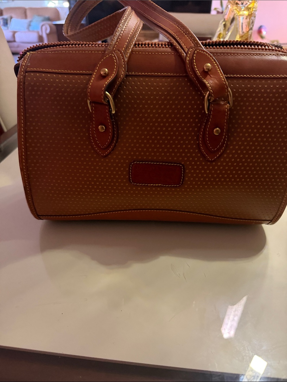 Dooney & Bourke Brown Perforated Leather Toiletry Bag